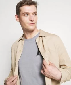 Pier One Assurance De l’Authenticité T-shirt imprimé t-shirts col rond homme -magasin Pier One 54ac258f85234b22b1b95fb77a4d81de