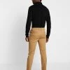 Pier One En promotion Chino - beige pantalons normale homme